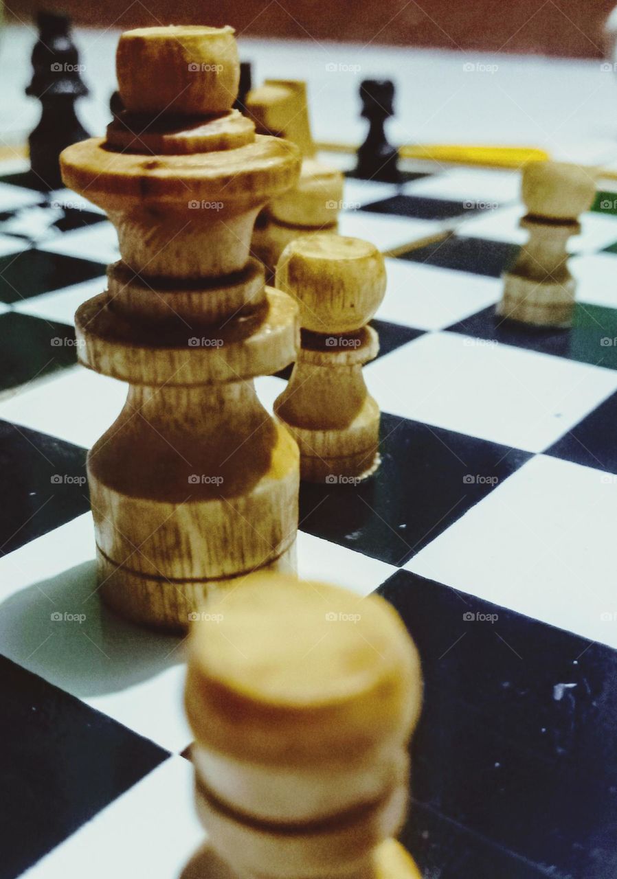 Chessboard and chess pieces.