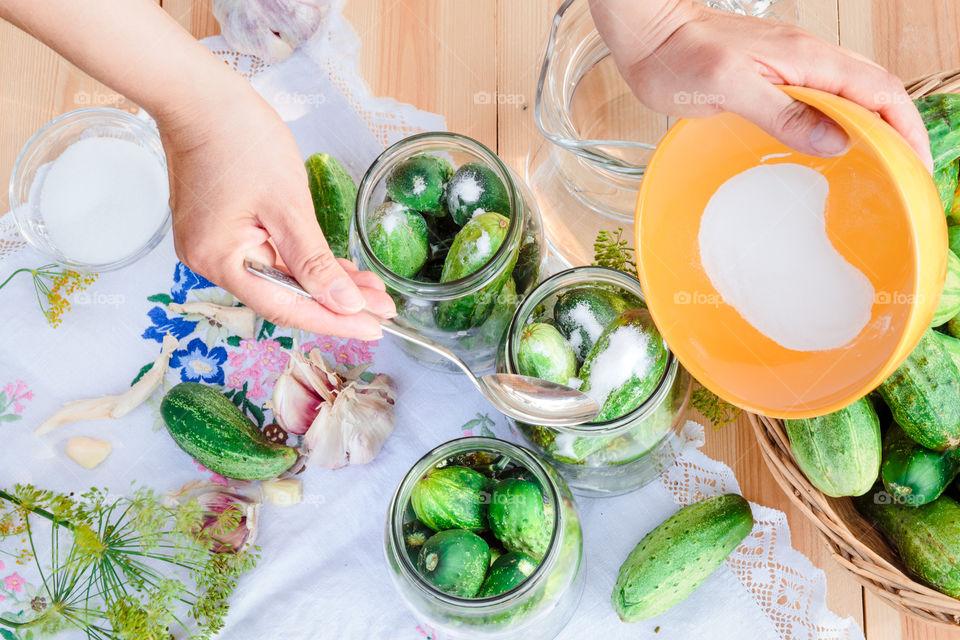 Pickling cucumbers. Pickling cucumbers with home garden vegetables and herbs