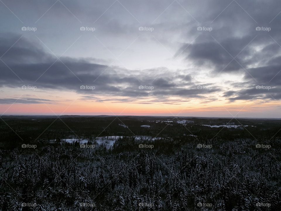 Sunset over Latvia in cold winter evening from sightsee tower