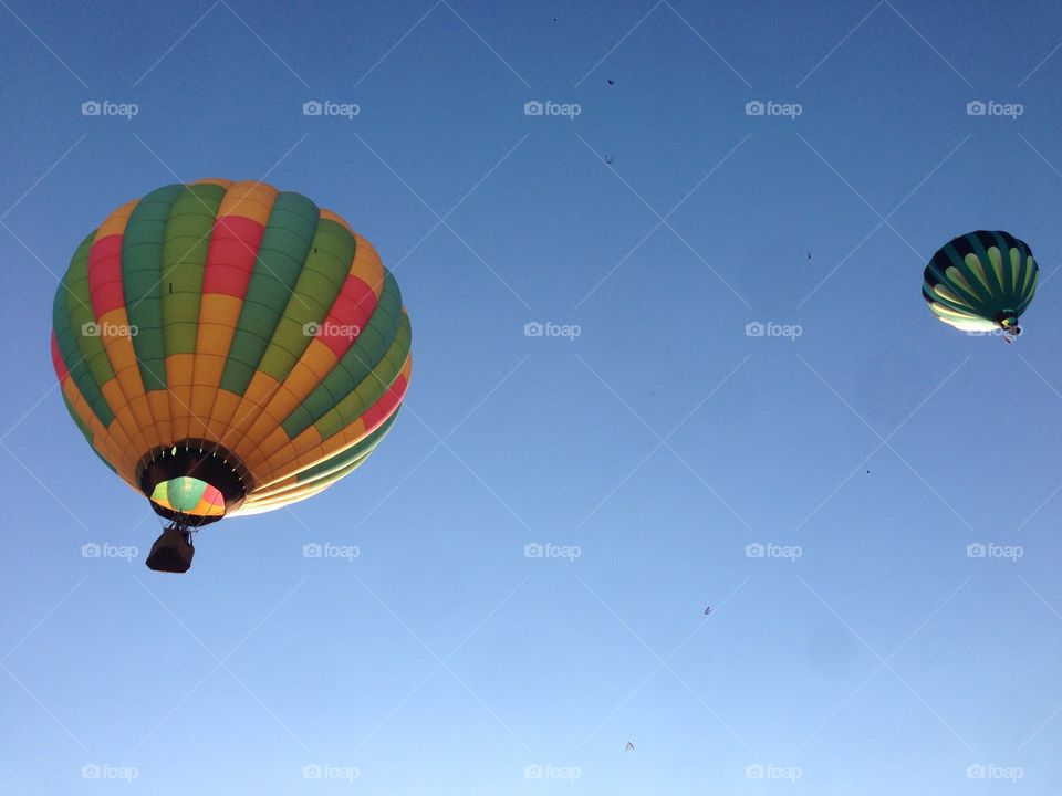 Hot air balloons. Looking up at hot air balloons against a beautiful bright blue Wyoming sky