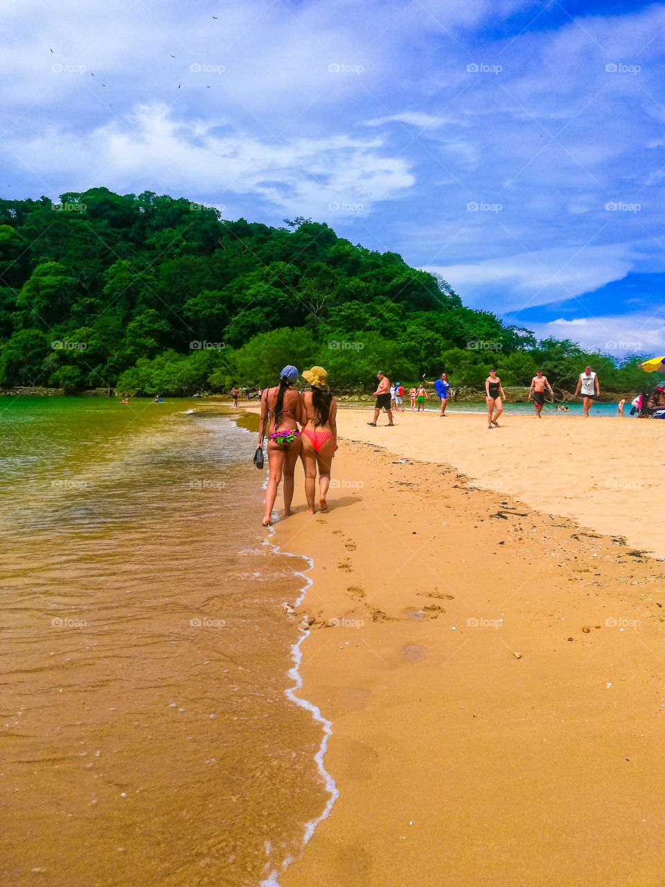 together walking in the beach