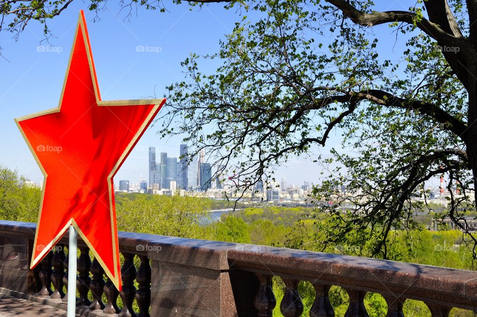 Communism and capitalism. View on Moscow financial city. 