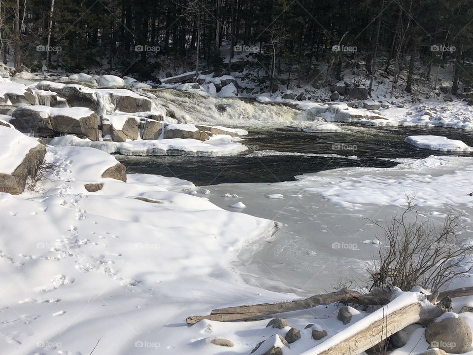 A stop in the snow covered mountains of New Hampshire, this photo was taken on the Kancamagus Highway in the White Mountains.