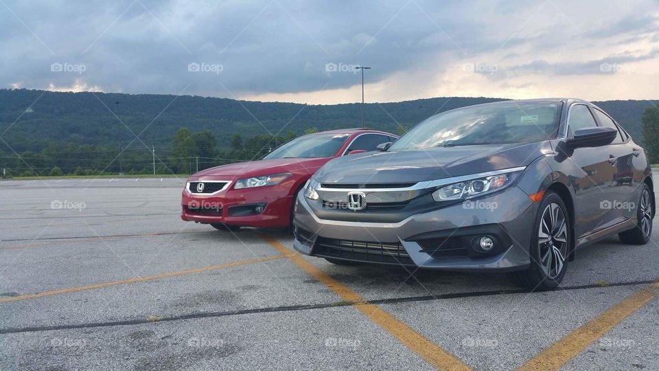 Hubby and wife Hondas
