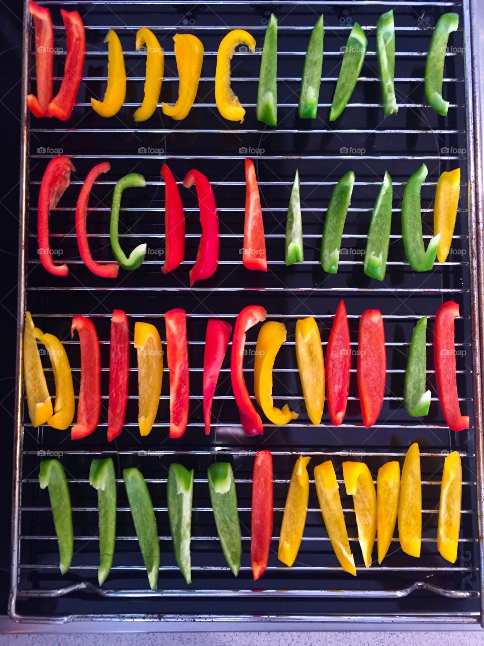 Colourful capsicums on grill 