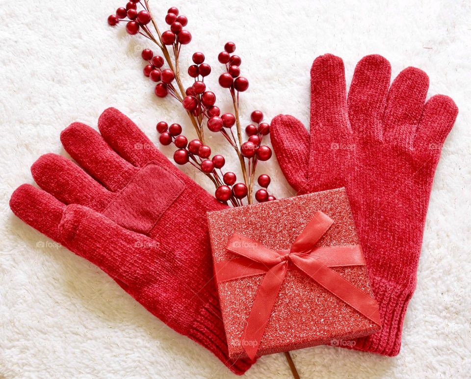 Red gloves flat lay 