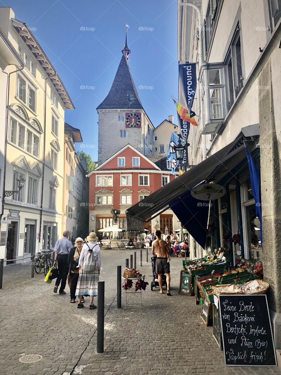 Wandering through Zürich in July, the streets are bustling with markets and shoppers 