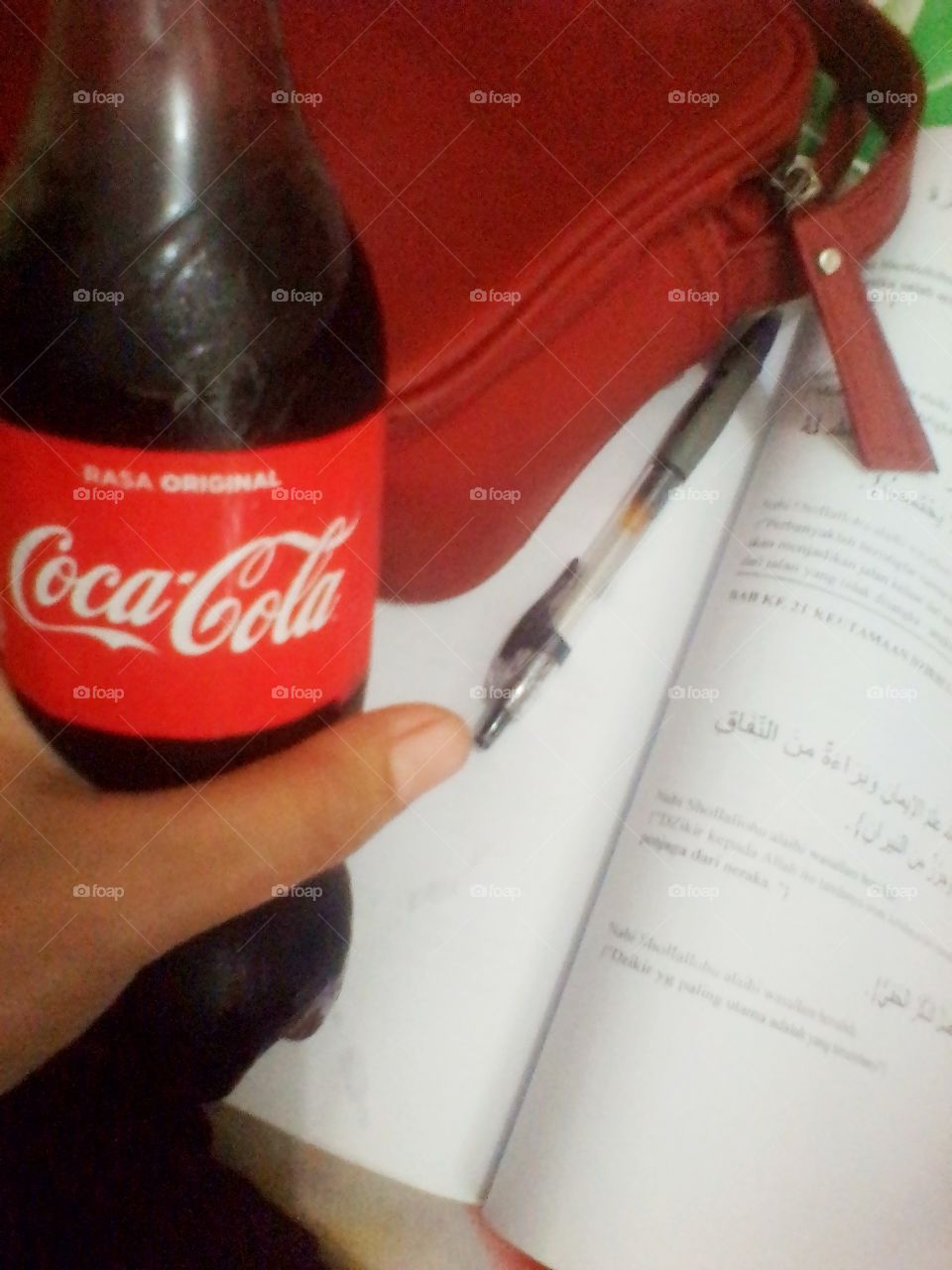 Learn while holding a cold bottle of coca cola