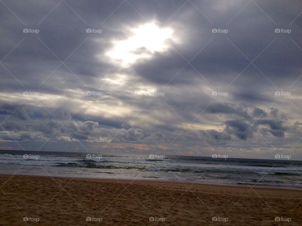 Fogo and clouds on the beach 