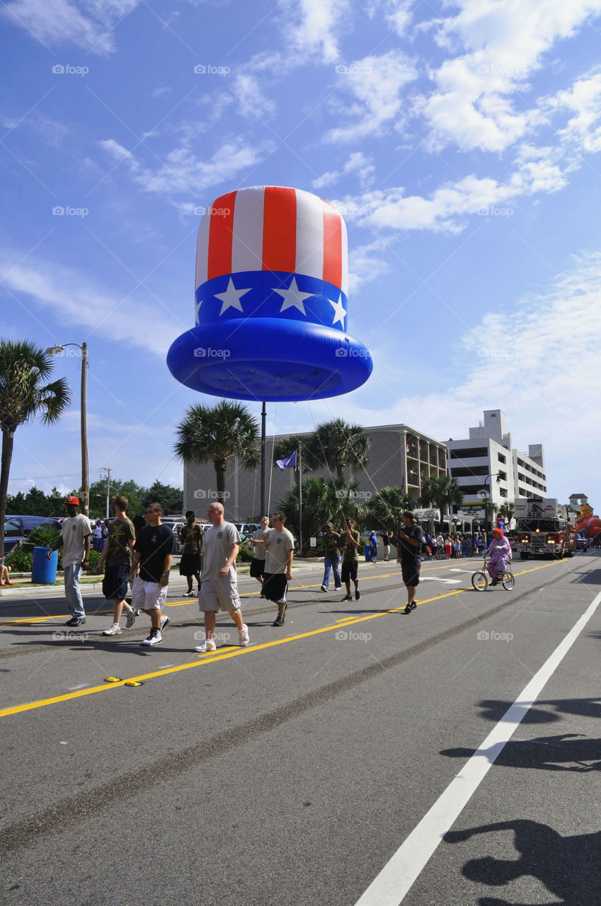 A patriotic float along a parade route.