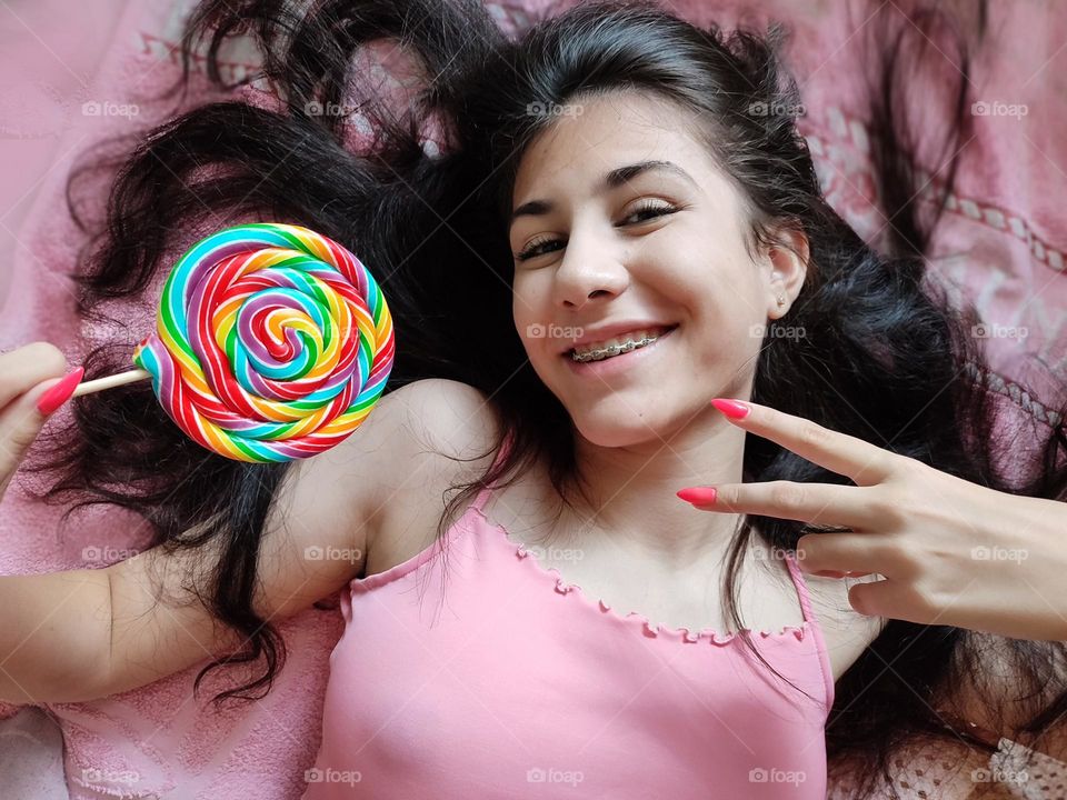 Vibrant Portrait of Girl with Big Lollipop