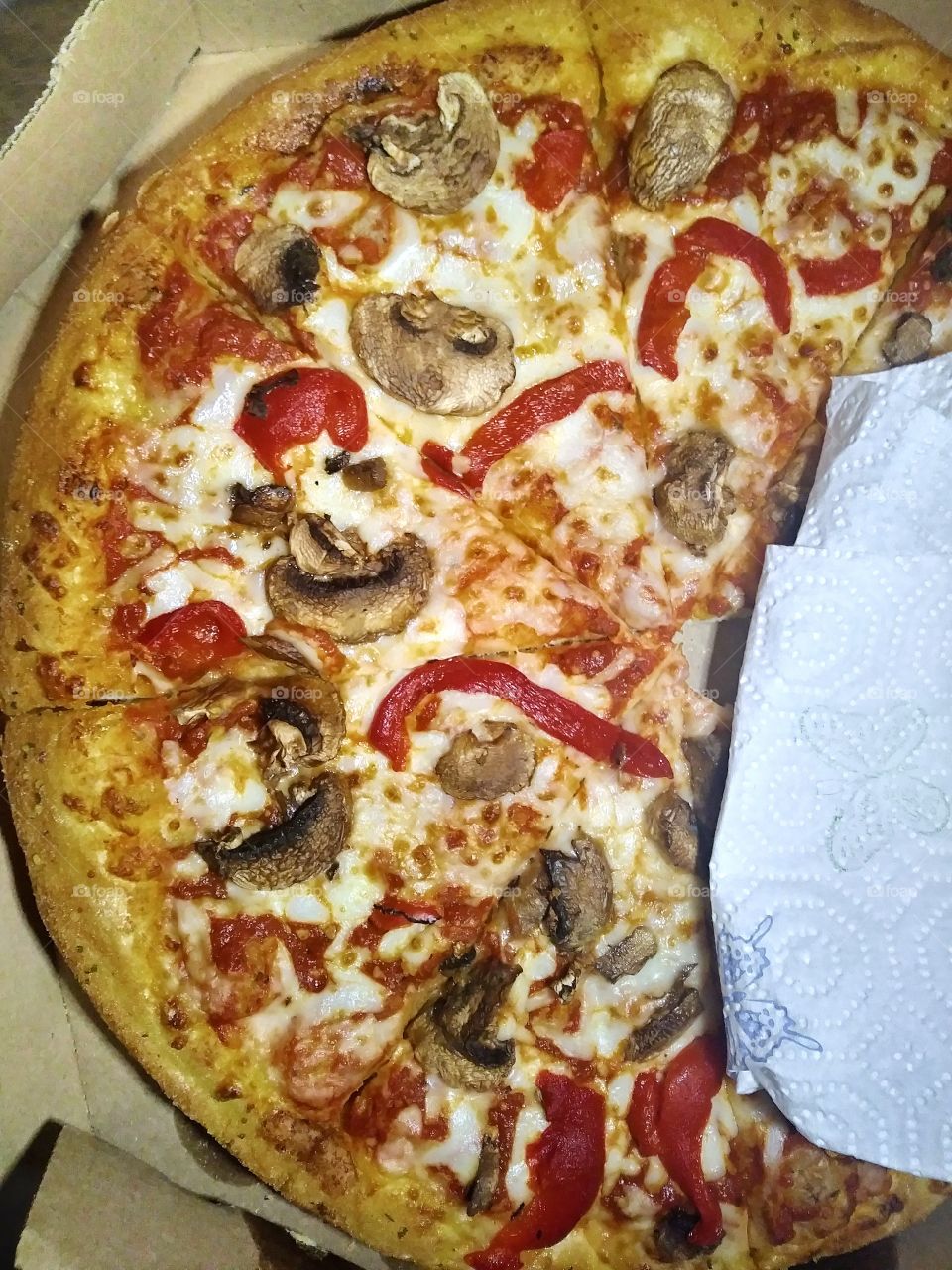 Pizza with mushrooms and red be