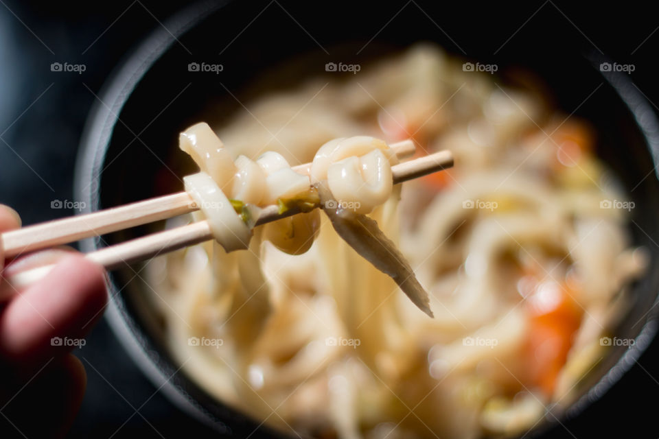 Eating udon noodles.Japan real food/takeaway/cheap food