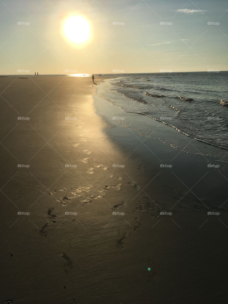 Sandy footprints at sunrise 