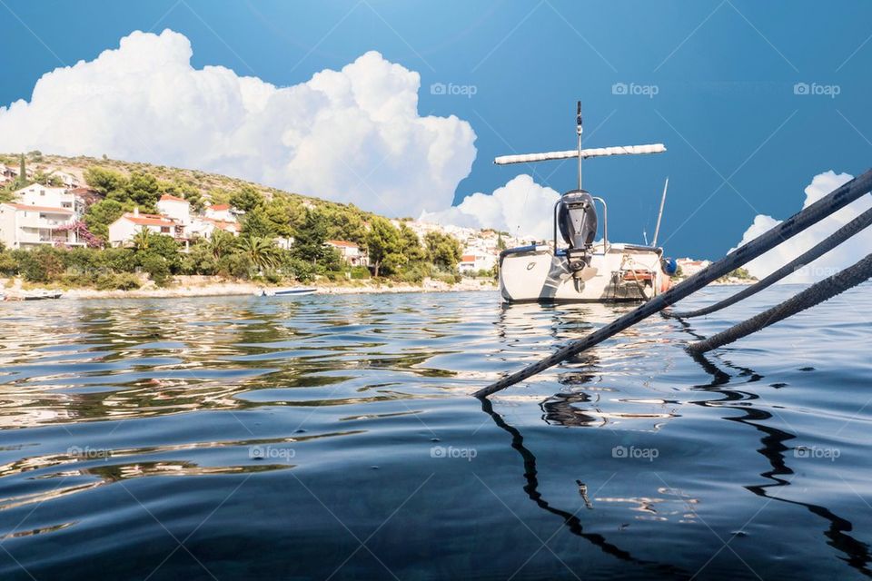 Boat anchoring at bay in Croatia