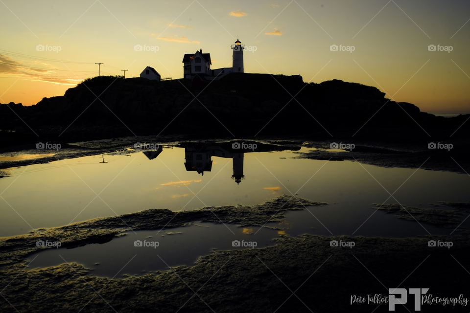 Nubble Lighthouse in York Maine during the sunrise