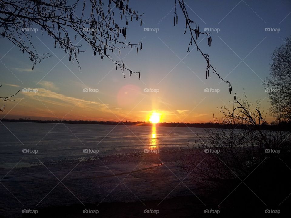 grayness of the day and dim the sun