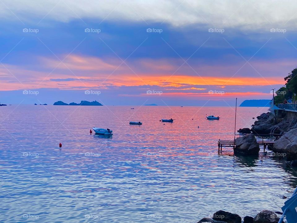 Lovely shades of orange and blue from a sunset on the Adriatic Coast.