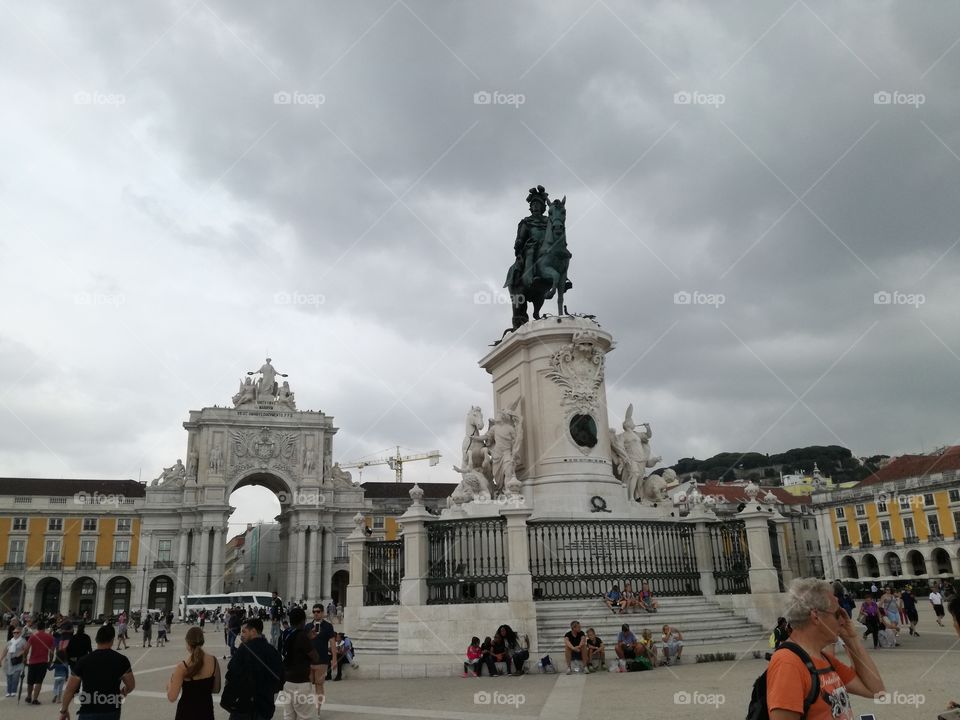 Lisbon square with arch and statue