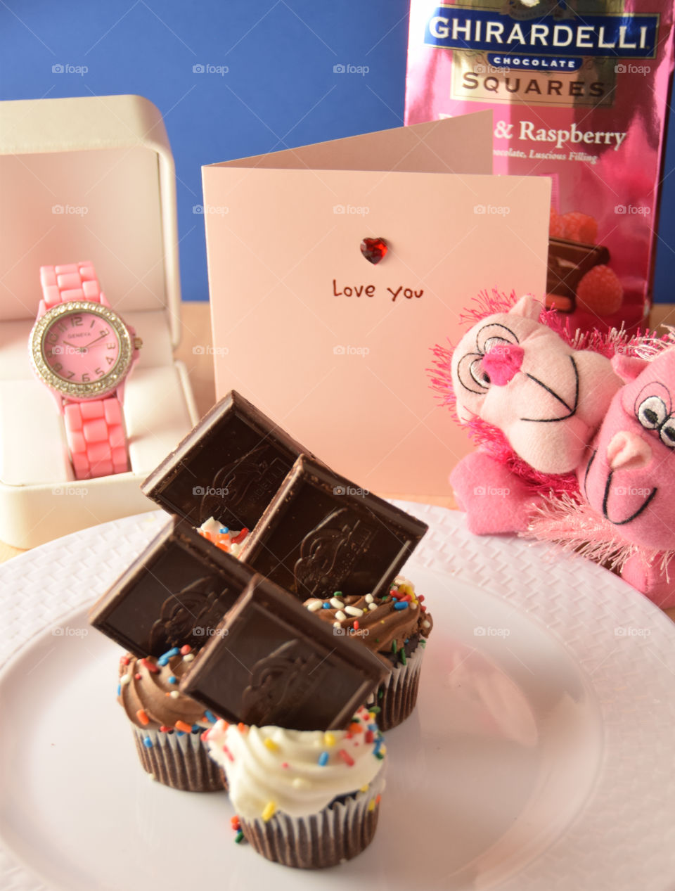 Gira deli chocolates on top of miniature cupcakes, tabletop presentation