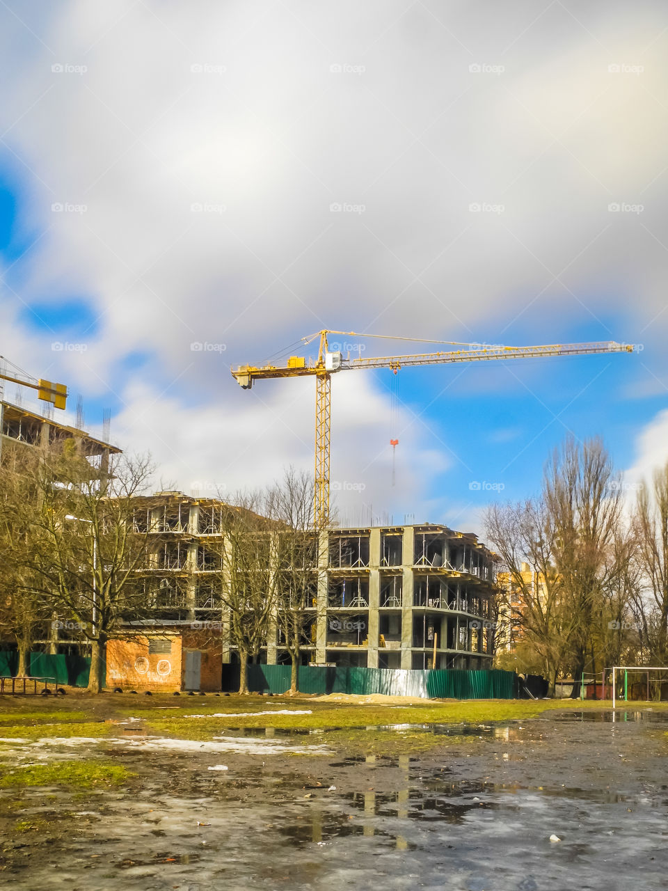 building process with crane on long exposure