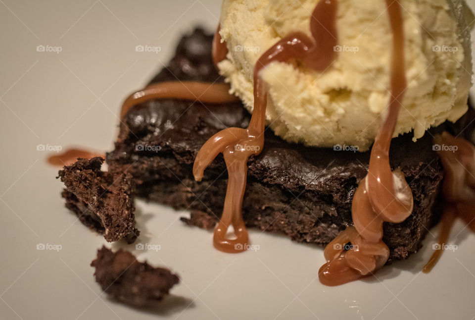 Home brownie with ice cream and caramel 
