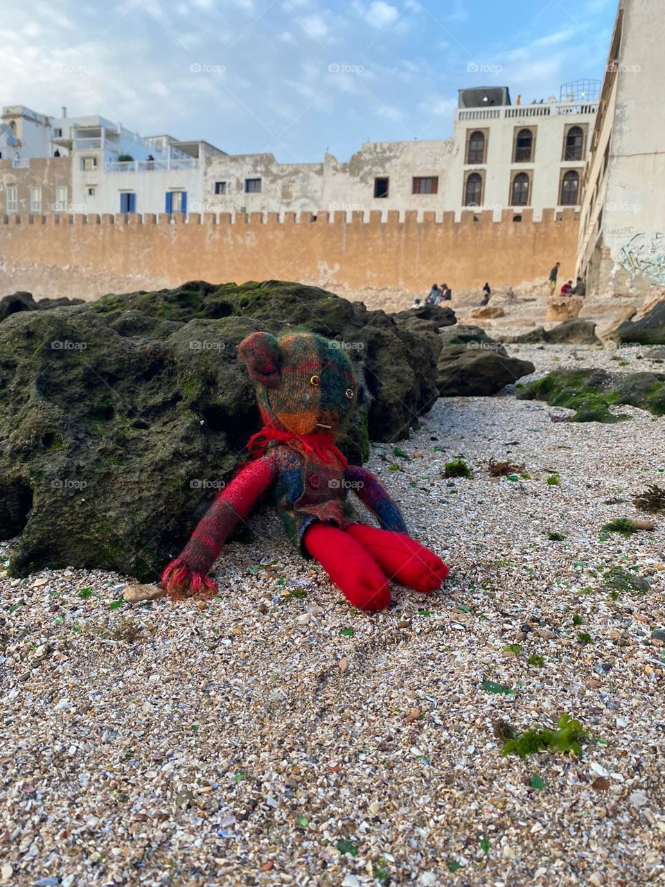 The beautiful doll sleeping in the beach.