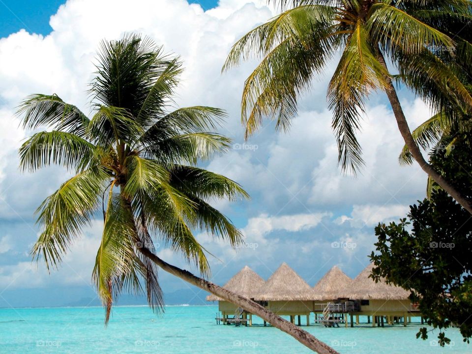 Overwater bungalows, Bora Bora. Overwater bungalows at the Intercontinental Hotel on Matira Beach in Bora Bora, French Polynedia