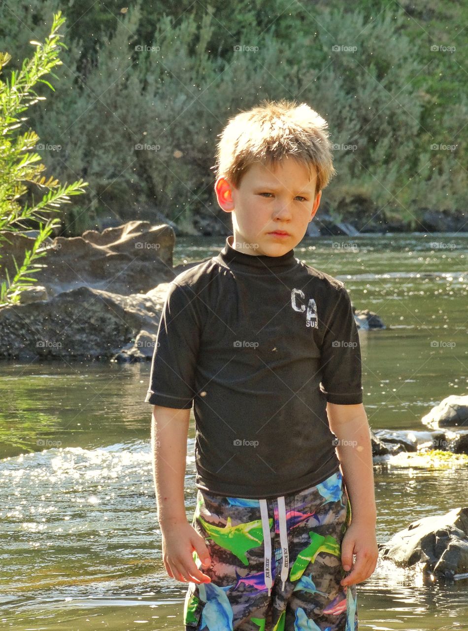 Autistic Child. Young Boy With Autism In Nature
