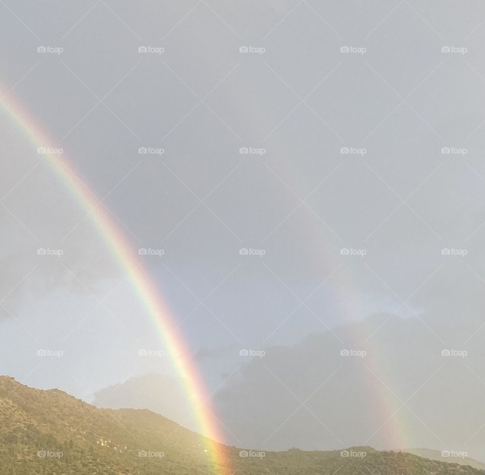 Nature’s own paintbrush. The beauty and wonder of a double rainbow.