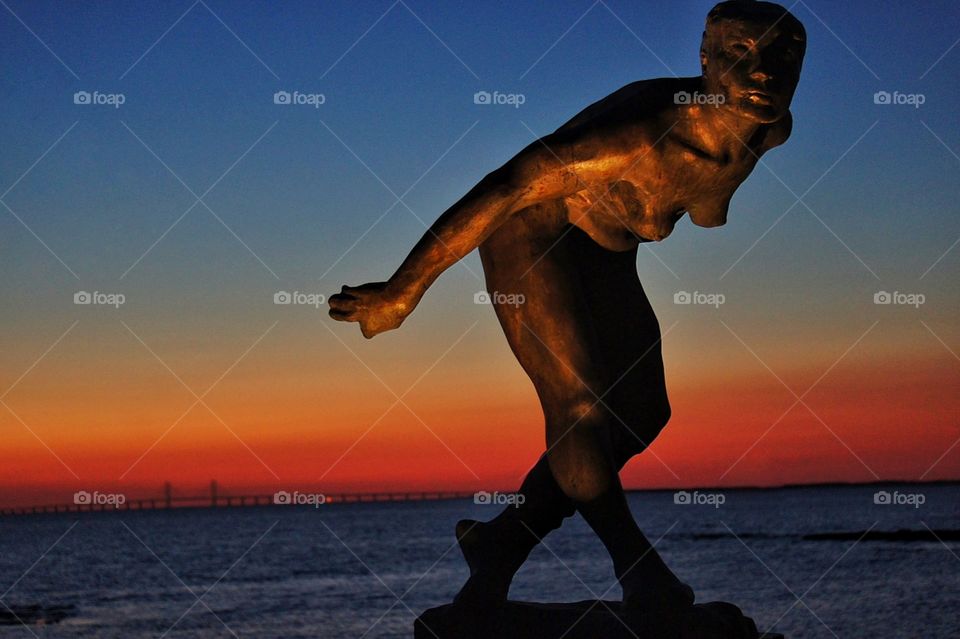 Statue in sunset