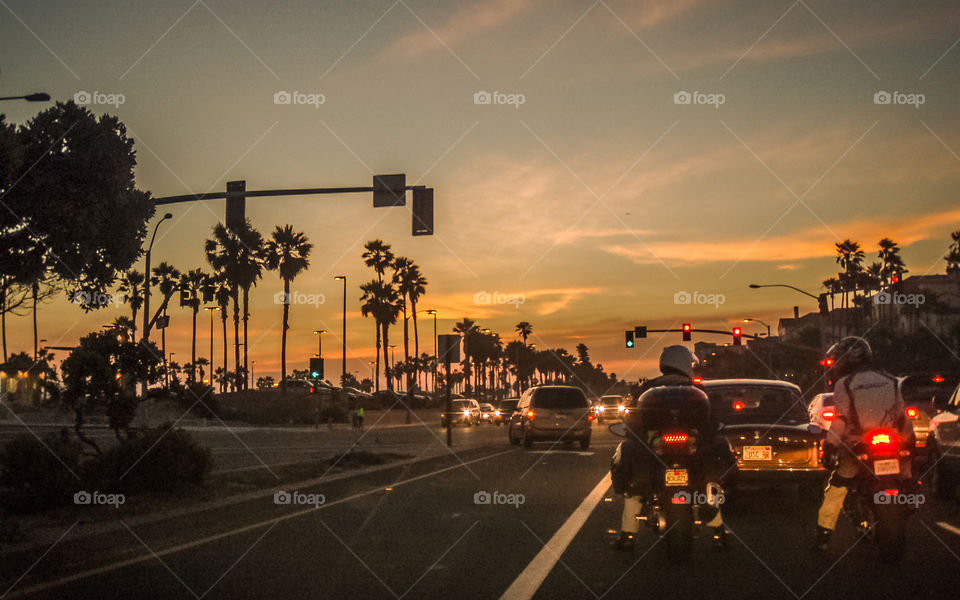 Huntington Beach magic hour. Sunset at California cross road Huntington beach