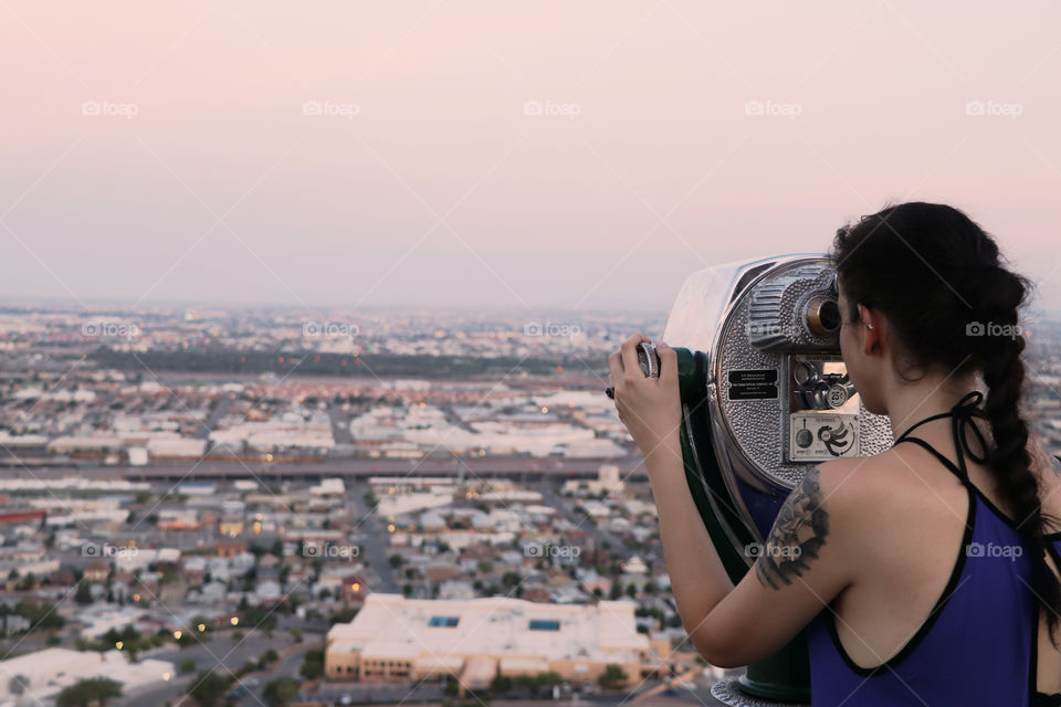 young woman looking over El Paso