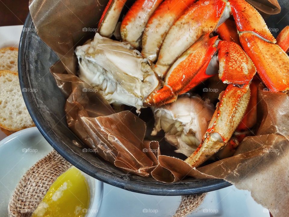 Steamed red crab legs with melted butter
