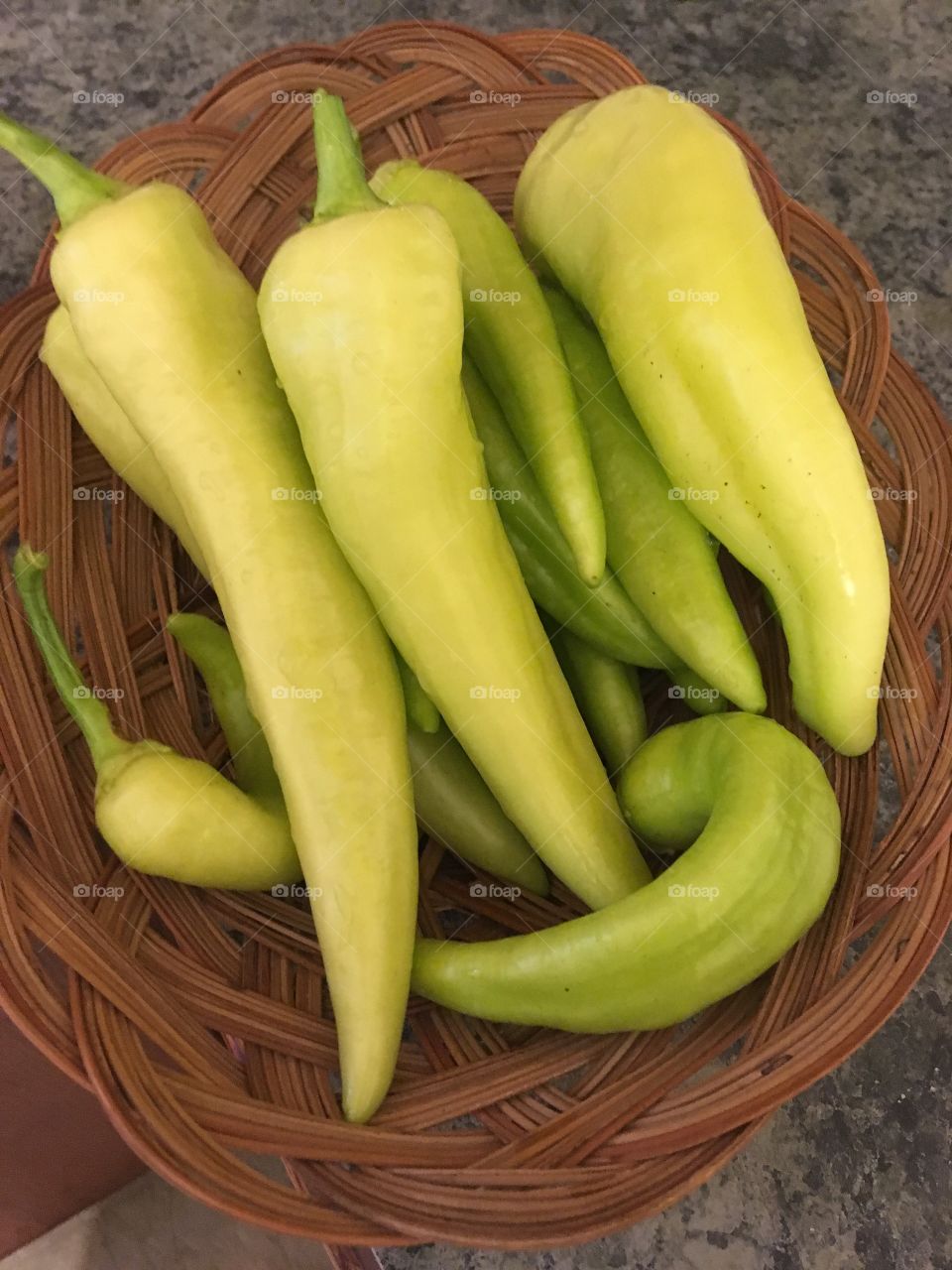 Out of my garden came these beautiful banana peppers today, some were so big they were weighing down the plants!