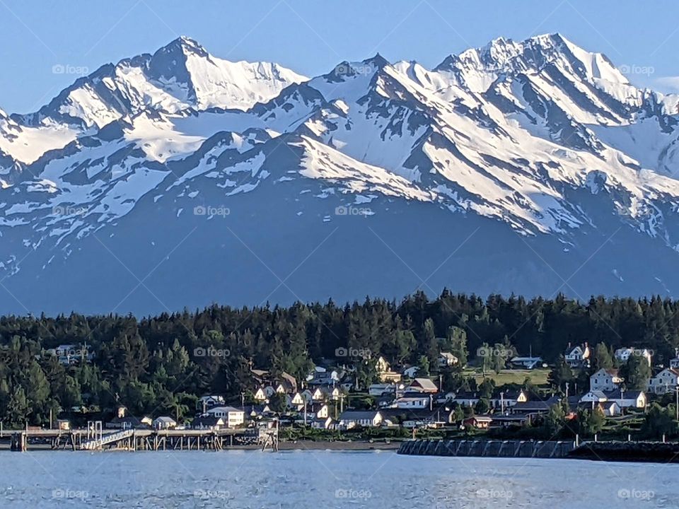 city with a view, mountain range background Alaska