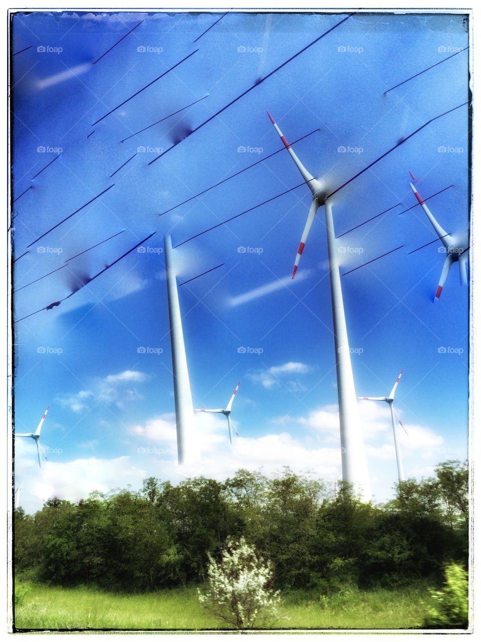 Windmills against a blue sky in Austria 