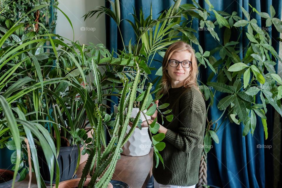 Woman at home with Plants