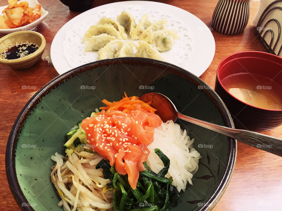 Korean food - Salmon bibimbap with mandu and soup