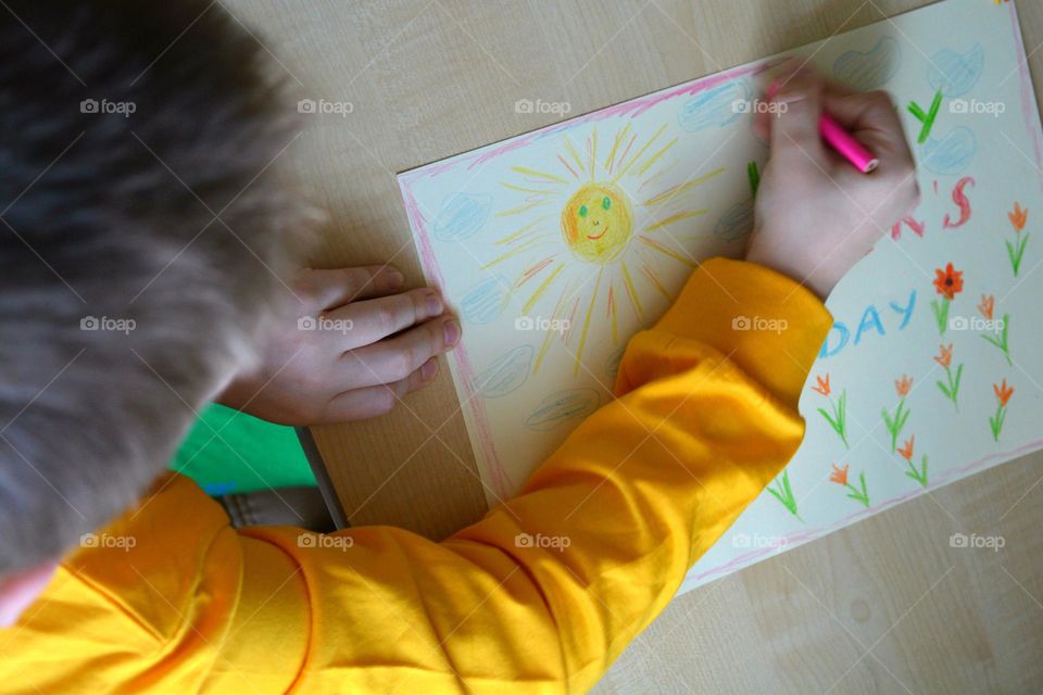 child boy drawing pencils, creative kind