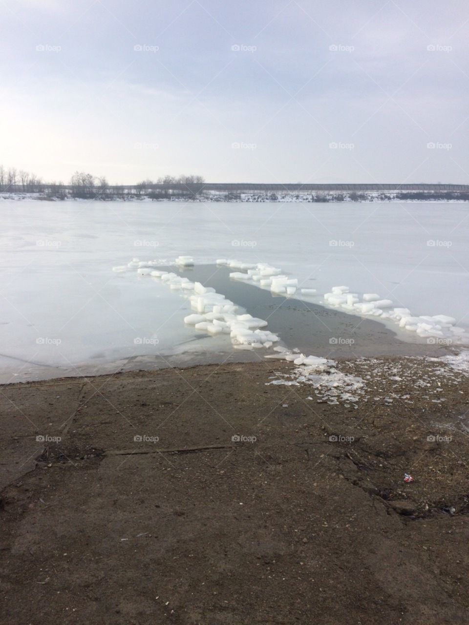 Frozen lake ready for swimmers