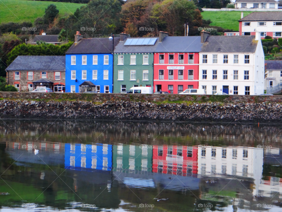 Reflection of house in river