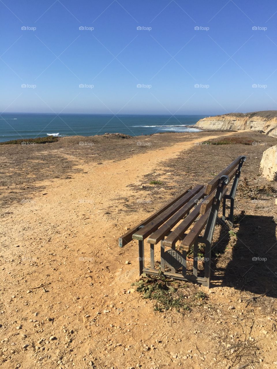 a bench overlooking the sea