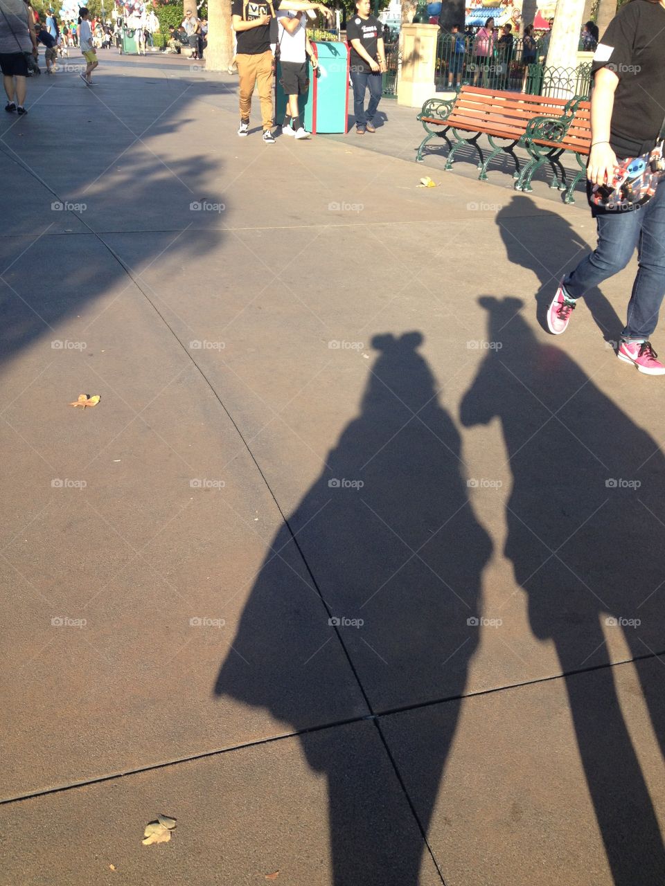 Minnie's Shadow. Shadow of two Minnie Mouses strolling through California Adventure Park