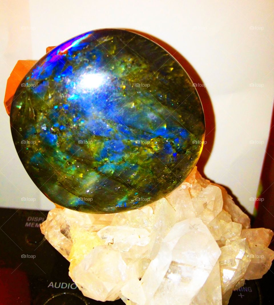Magic worry stone on crystal.