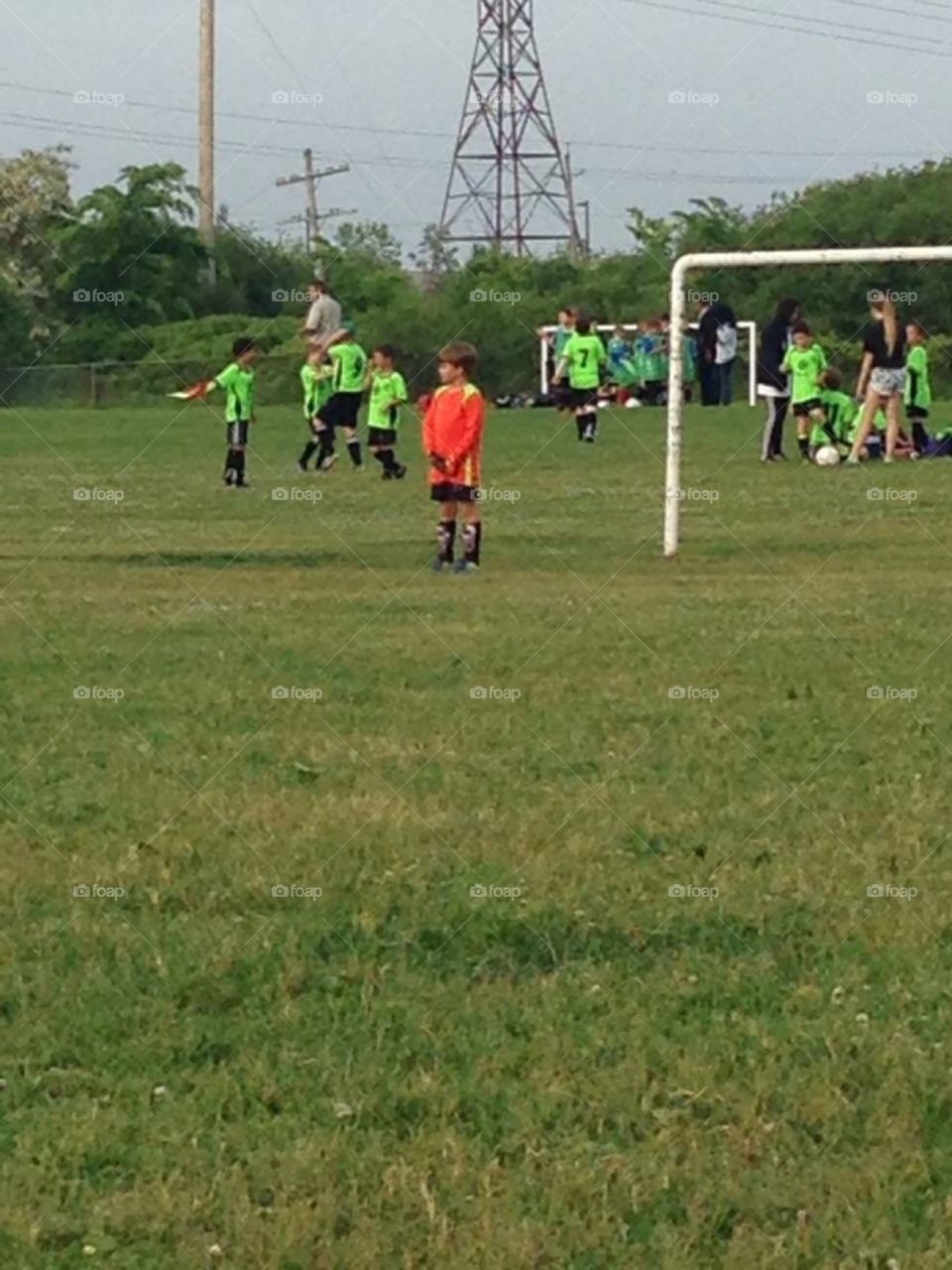 My brother in the field as a soccer goalie 