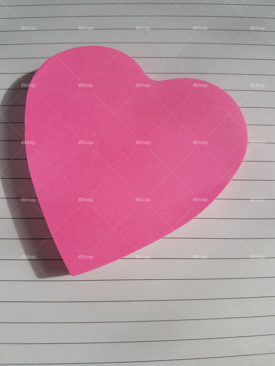 Pink heart shaped post it