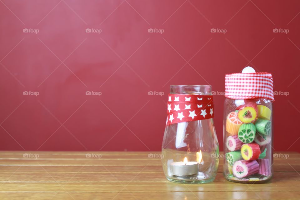 Boiled sweets and a candle