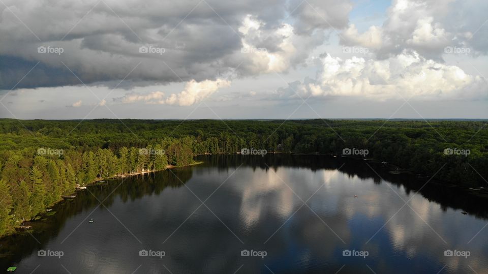 Flight over the lake on a cloudy day.
