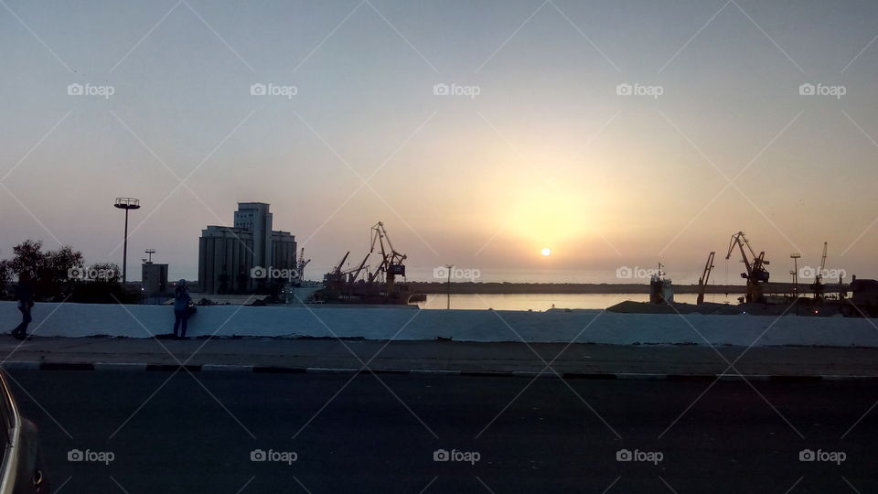 Sunset from a port